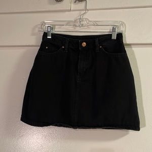 Black denim skirt